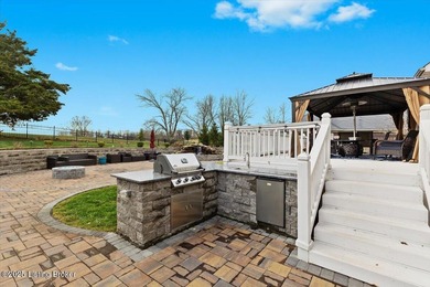 Imagine waking up, coffee in hand on your covered back deck on Eagle Creek Golf Course in Kentucky - for sale on GolfHomes.com, golf home, golf lot