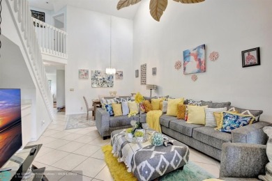 Beautiful 3BR/2.5BA townhouse with stunning golf and lake views on Woodmont Country Club in Florida - for sale on GolfHomes.com, golf home, golf lot