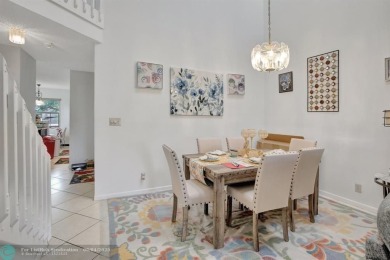 Beautiful 3BR/2.5BA townhouse with stunning golf and lake views on Woodmont Country Club in Florida - for sale on GolfHomes.com, golf home, golf lot