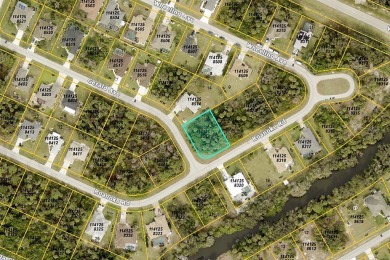 OVERSIZED CORNER LOT IN NORTH PORT - This oversized, residential on Bobcat Trail Golf Club in Florida - for sale on GolfHomes.com, golf home, golf lot