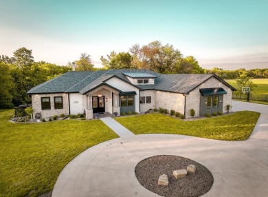 Welcome to Creekside Hideaway, a breathtaking 3-acre executive on Beaver Creek Golf Course in Iowa - for sale on GolfHomes.com, golf home, golf lot