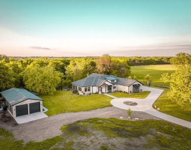 Welcome to Creekside Hideaway, a breathtaking 3-acre executive on Beaver Creek Golf Course in Iowa - for sale on GolfHomes.com, golf home, golf lot