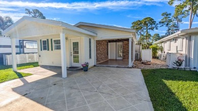 This RV site has a beautiful executive suite with a lake view on The Great Outdoors Golf and Country Club in Florida - for sale on GolfHomes.com, golf home, golf lot