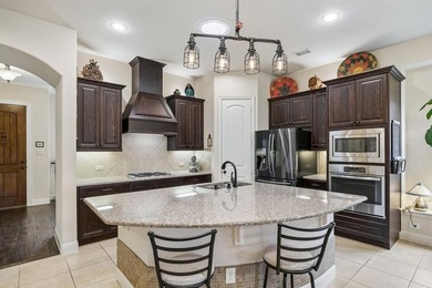 Welcome to 420 Heritage Lane, a well-maintained residence on Woodbridge Golf Club in Texas - for sale on GolfHomes.com, golf home, golf lot