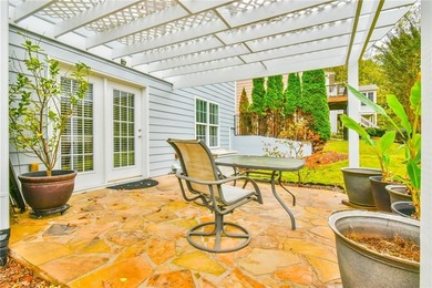 Welcome to this beautifully maintained four-bedroom, three-bath on Reunion Golf Club in Georgia - for sale on GolfHomes.com, golf home, golf lot