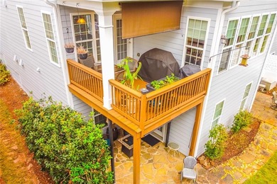 Welcome to this beautifully maintained four-bedroom, three-bath on Reunion Golf Club in Georgia - for sale on GolfHomes.com, golf home, golf lot