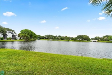 Unwind in luxury at this beautifully updated first floor on Boca West Golf and Country Club in Florida - for sale on GolfHomes.com, golf home, golf lot