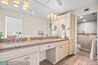 Unwind in luxury at this beautifully updated first floor on Boca West Golf and Country Club in Florida - for sale on GolfHomes.com, golf home, golf lot
