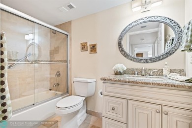 Unwind in luxury at this beautifully updated first floor on Boca West Golf and Country Club in Florida - for sale on GolfHomes.com, golf home, golf lot