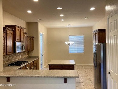 Experience luxury living in this beautifully upgraded Golden on Palm Valley Golf Club  in Arizona - for sale on GolfHomes.com, golf home, golf lot