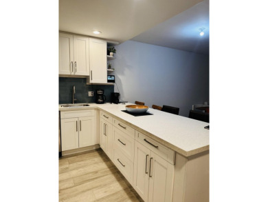 Spacious and bright 3 bedrooms 2 bathrooms condo located in the on Palm-Aire Country Club and Resort - Palms in Florida - for sale on GolfHomes.com, golf home, golf lot