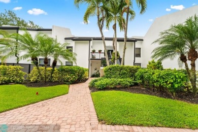 Unwind in luxury at this beautifully updated first floor on Boca West Golf and Country Club in Florida - for sale on GolfHomes.com, golf home, golf lot