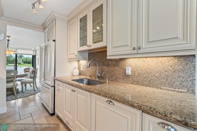 Unwind in luxury at this beautifully updated first floor on Boca West Golf and Country Club in Florida - for sale on GolfHomes.com, golf home, golf lot