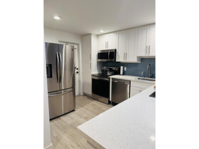 Spacious and bright 3 bedrooms 2 bathrooms condo located in the on Palm-Aire Country Club and Resort - Palms in Florida - for sale on GolfHomes.com, golf home, golf lot