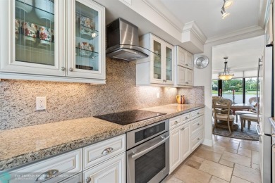 Unwind in luxury at this beautifully updated first floor on Boca West Golf and Country Club in Florida - for sale on GolfHomes.com, golf home, golf lot