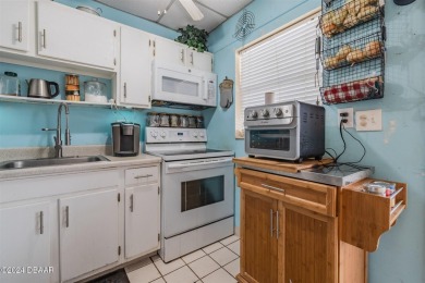 MOTIVATED SELLER! BRING US YOUR OFFER! Imagine relaxing on your on Daytona Beach Golf Club in Florida - for sale on GolfHomes.com, golf home, golf lot