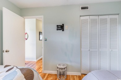 This spacious, freshly painted 3rd-floor, end unit, condo offers on Possum Trot Golf Course in South Carolina - for sale on GolfHomes.com, golf home, golf lot