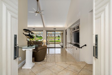 Experience true resort living in this spectacular lakefront on Mission Hills Golf Club in California - for sale on GolfHomes.com, golf home, golf lot