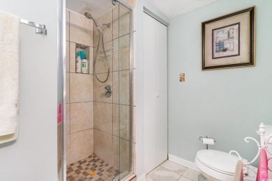 This spacious, freshly painted 3rd-floor, end unit, condo offers on Possum Trot Golf Course in South Carolina - for sale on GolfHomes.com, golf home, golf lot