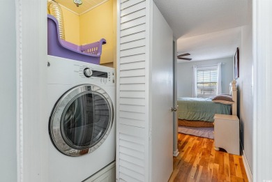 This spacious, freshly painted 3rd-floor, end unit, condo offers on Possum Trot Golf Course in South Carolina - for sale on GolfHomes.com, golf home, golf lot