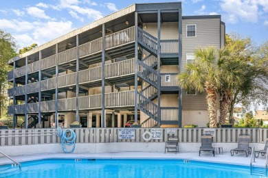 This spacious, freshly painted 3rd-floor, end unit, condo offers on Possum Trot Golf Course in South Carolina - for sale on GolfHomes.com, golf home, golf lot