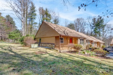 You will love this charming 2-bedroom, 2-bathroom end-unit condo on Etowah Valley Golf Club in North Carolina - for sale on GolfHomes.com, golf home, golf lot
