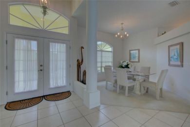 This large, TURNKEY furnished 4 bed/3 bath home is in the small on Duffys Golf Center in Florida - for sale on GolfHomes.com, golf home, golf lot