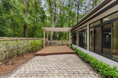 Full of charm, space, and thoughtful updates, this Haile on Haile Plantation Golf and Country Club in Florida - for sale on GolfHomes.com, golf home, golf lot