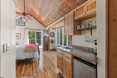 Two fully furnished studio units combined into one larger living on Red Bird Golf Links in North Carolina - for sale on GolfHomes.com, golf home, golf lot