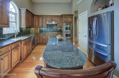 A Cut Above, Golf Front on a large, wooded lot.  This home is on Tanasi Golf Course in Tennessee - for sale on GolfHomes.com, golf home, golf lot