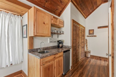 Two fully furnished studio units combined into one larger living on Red Bird Golf Links in North Carolina - for sale on GolfHomes.com, golf home, golf lot