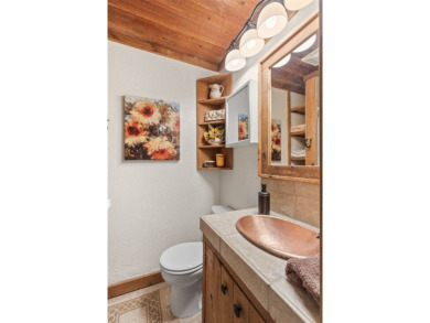 Two fully furnished studio units combined into one larger living on Red Bird Golf Links in North Carolina - for sale on GolfHomes.com, golf home, golf lot