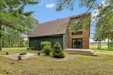 Experience refined lake living in this stunning 3BR, 2BA home on Northern Bay Golf Resort and Marina in Wisconsin - for sale on GolfHomes.com, golf home, golf lot