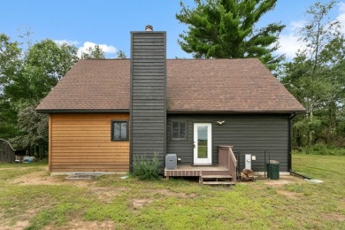 Experience refined lake living in this stunning 3BR, 2BA home on Northern Bay Golf Resort and Marina in Wisconsin - for sale on GolfHomes.com, golf home, golf lot