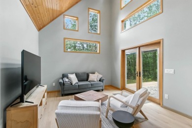 Experience refined lake living in this stunning 3BR, 2BA home on Northern Bay Golf Resort and Marina in Wisconsin - for sale on GolfHomes.com, golf home, golf lot