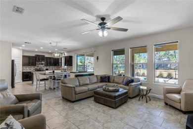 Stunning 4BD/3.5BA Pool Home with Tesla Solar System on an on Orange County National Golf Center and Lodge in Florida - for sale on GolfHomes.com, golf home, golf lot