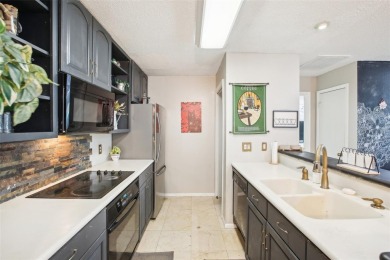 Under contract-accepting backup offers. Charming 3 bedroom, 2 on Hunters Green Country Club in Florida - for sale on GolfHomes.com, golf home, golf lot