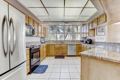 Discover Your Dream Oasis! Step into this exceptional on Pasadena Yacht and Country Club in Florida - for sale on GolfHomes.com, golf home, golf lot