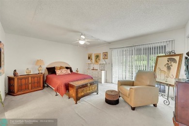 Priced under market! Well maintained 1 bed, 1.5 bath condo in on Wynmoor Golf Course in Florida - for sale on GolfHomes.com, golf home, golf lot