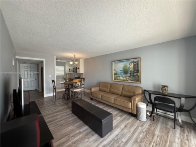 Beautifully upgraded 1 bedroom 1 bath  condo with shaker on Sunrise Lakes Phase III in Florida - for sale on GolfHomes.com, golf home, golf lot