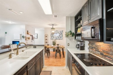 Under contract-accepting backup offers. Charming 3 bedroom, 2 on Hunters Green Country Club in Florida - for sale on GolfHomes.com, golf home, golf lot