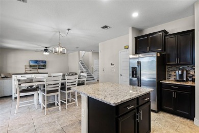 Stunning 4BD/3.5BA Pool Home with Tesla Solar System on an on Orange County National Golf Center and Lodge in Florida - for sale on GolfHomes.com, golf home, golf lot