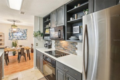 Under contract-accepting backup offers. Charming 3 bedroom, 2 on Hunters Green Country Club in Florida - for sale on GolfHomes.com, golf home, golf lot