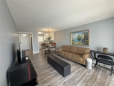 Beautifully upgraded 1 bedroom 1 bath  condo with shaker on Sunrise Lakes Phase III in Florida - for sale on GolfHomes.com, golf home, golf lot