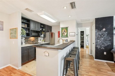 Under contract-accepting backup offers. Charming 3 bedroom, 2 on Hunters Green Country Club in Florida - for sale on GolfHomes.com, golf home, golf lot
