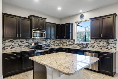 Stunning 4BD/3.5BA Pool Home with Tesla Solar System on an on Orange County National Golf Center and Lodge in Florida - for sale on GolfHomes.com, golf home, golf lot