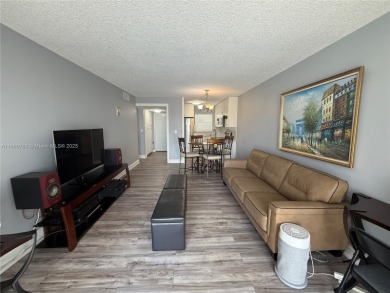Beautifully upgraded 1 bedroom 1 bath  condo with shaker on Sunrise Lakes Phase III in Florida - for sale on GolfHomes.com, golf home, golf lot