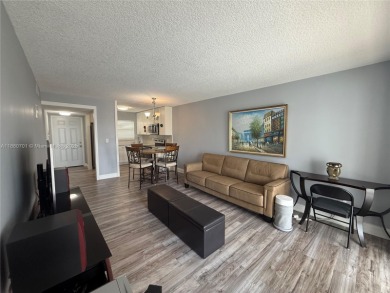 Beautifully upgraded 1 bedroom 1 bath  condo with shaker on Sunrise Lakes Phase III in Florida - for sale on GolfHomes.com, golf home, golf lot