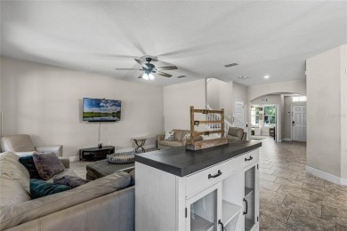 Stunning 4BD/3.5BA Pool Home with Tesla Solar System on an on Orange County National Golf Center and Lodge in Florida - for sale on GolfHomes.com, golf home, golf lot