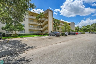 Priced under market! Well maintained 1 bed, 1.5 bath condo in on Wynmoor Golf Course in Florida - for sale on GolfHomes.com, golf home, golf lot